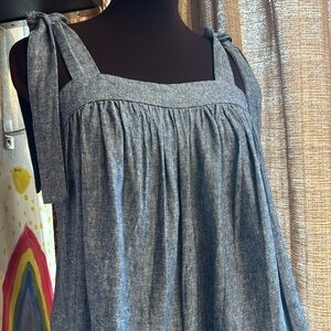 NWT a.n.a. Sleeveless cropped smocked solid blue linen/rayon blouse. Size XS.